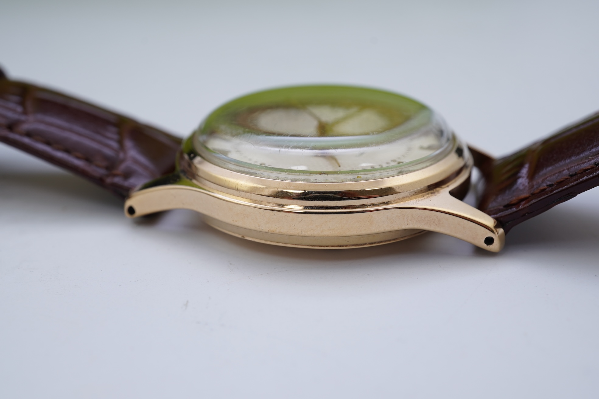 A gentleman's early 1960's 9ct gold Smiths De Luxe manual wind wrist watch